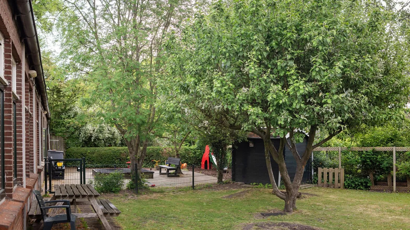 De tuin van peuteropvang Oog in Al bij kinderopvang Kind&co Ludens