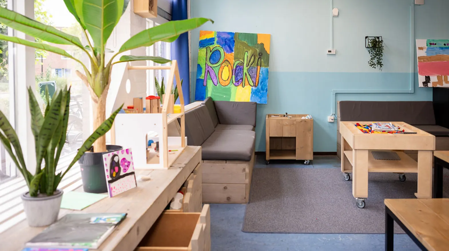 Verschillende speelhoeken in de groepsruimte van buitenschoolse opvang de Jutter, kinderopvang Kind&co Ludens