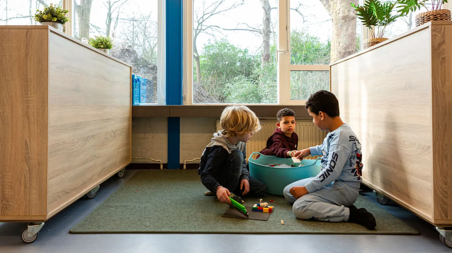 Kinderen spelen in de bouwhoek bij buitenschoolse opvang De Panter, kinderopvang Kind&co ludens