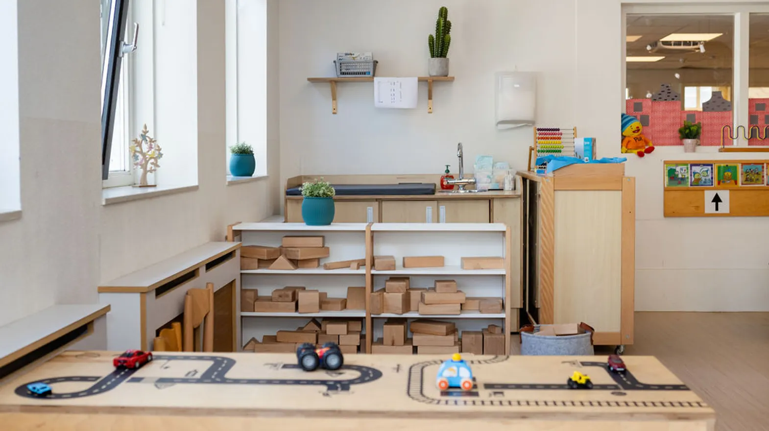 Binnenruimte van PO Schoolwoningen, Kind&co ludens