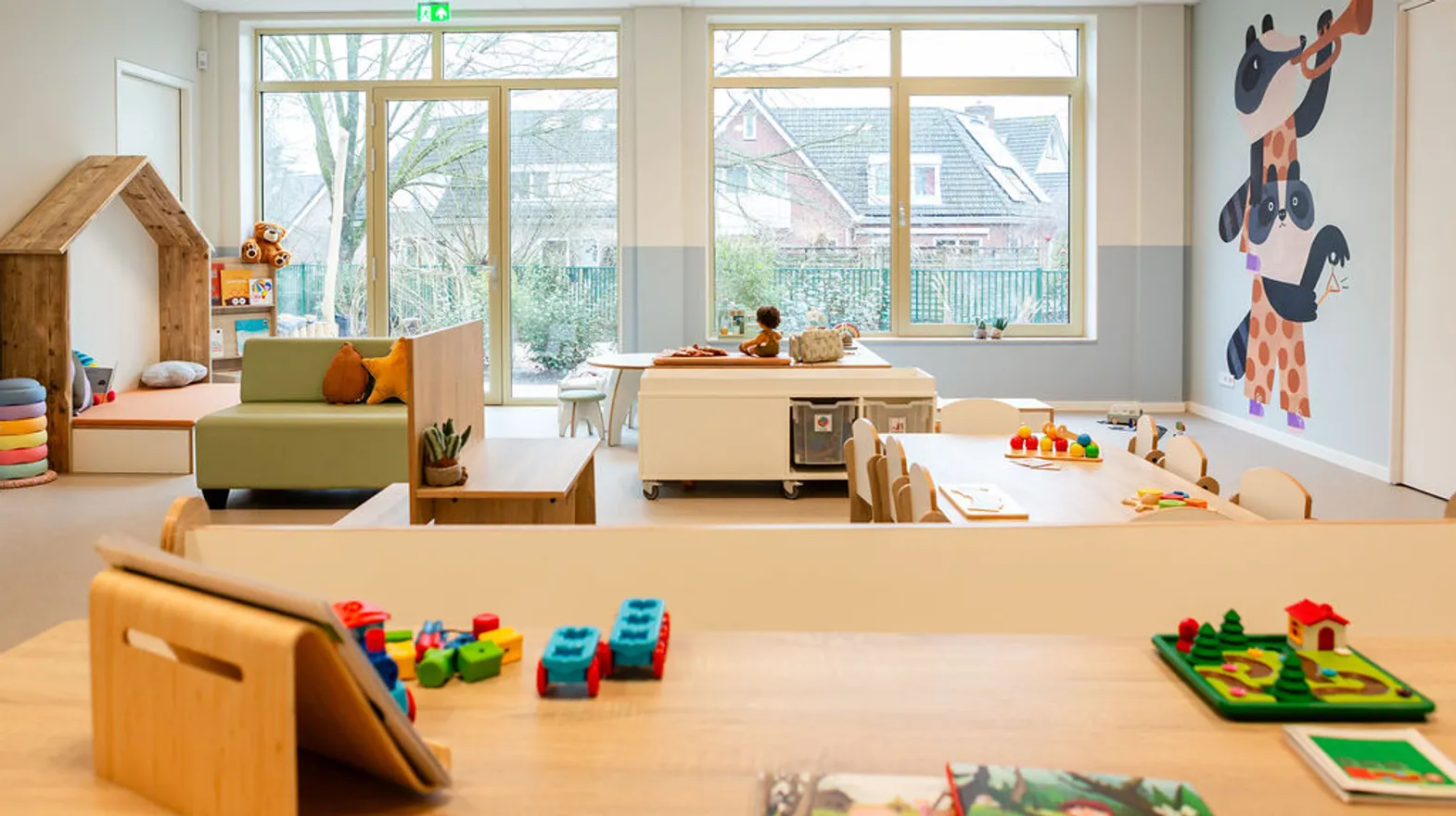 De groepsruimte met diverse speelhoeken bij peuteropvang de Triangel, kinderopvang Kind&co Ludens
