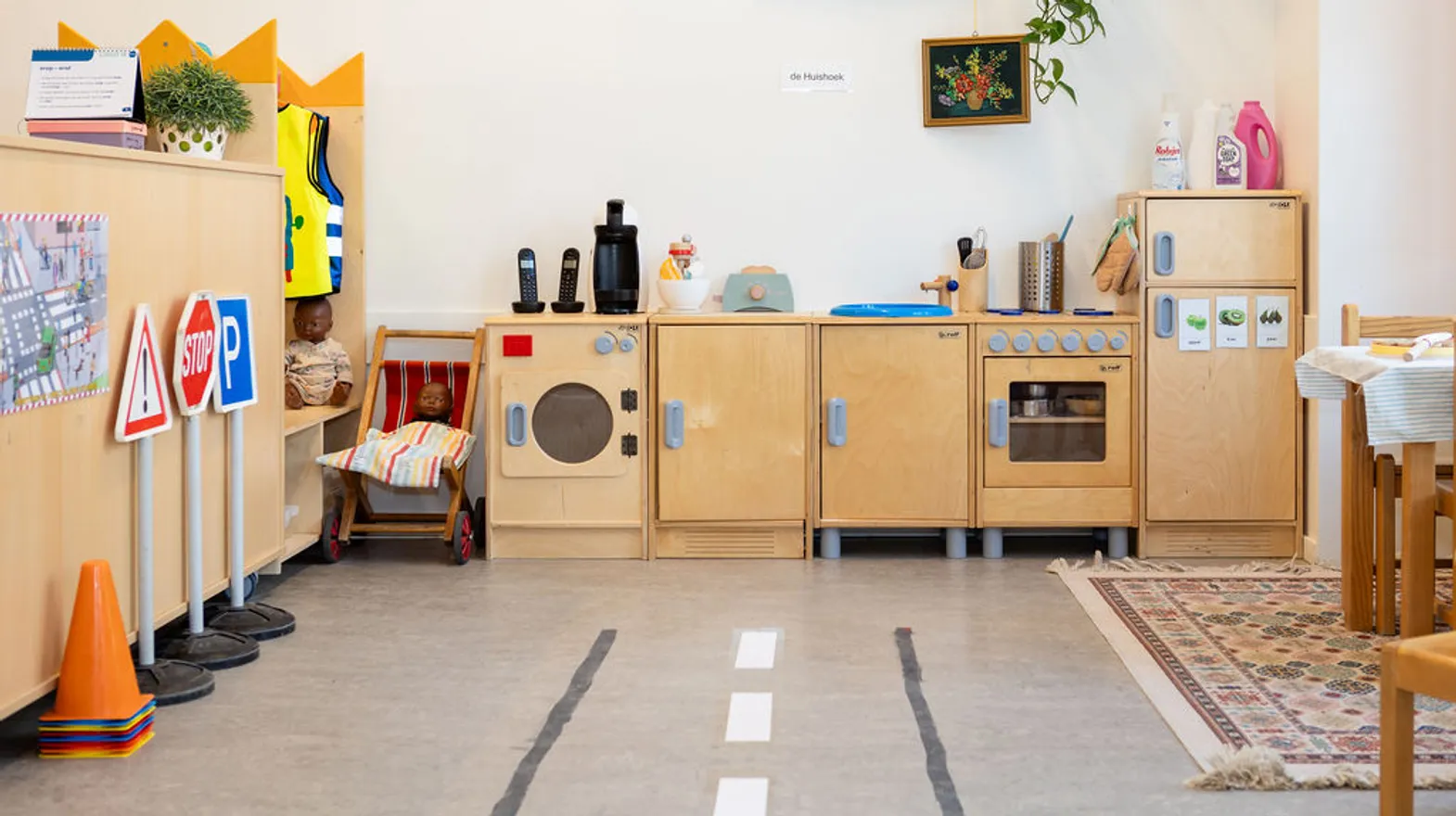 De huishoek en verkleedhoek van peuteropvang Dreumes Dribbel, kinderopvang Kind&co Ludens