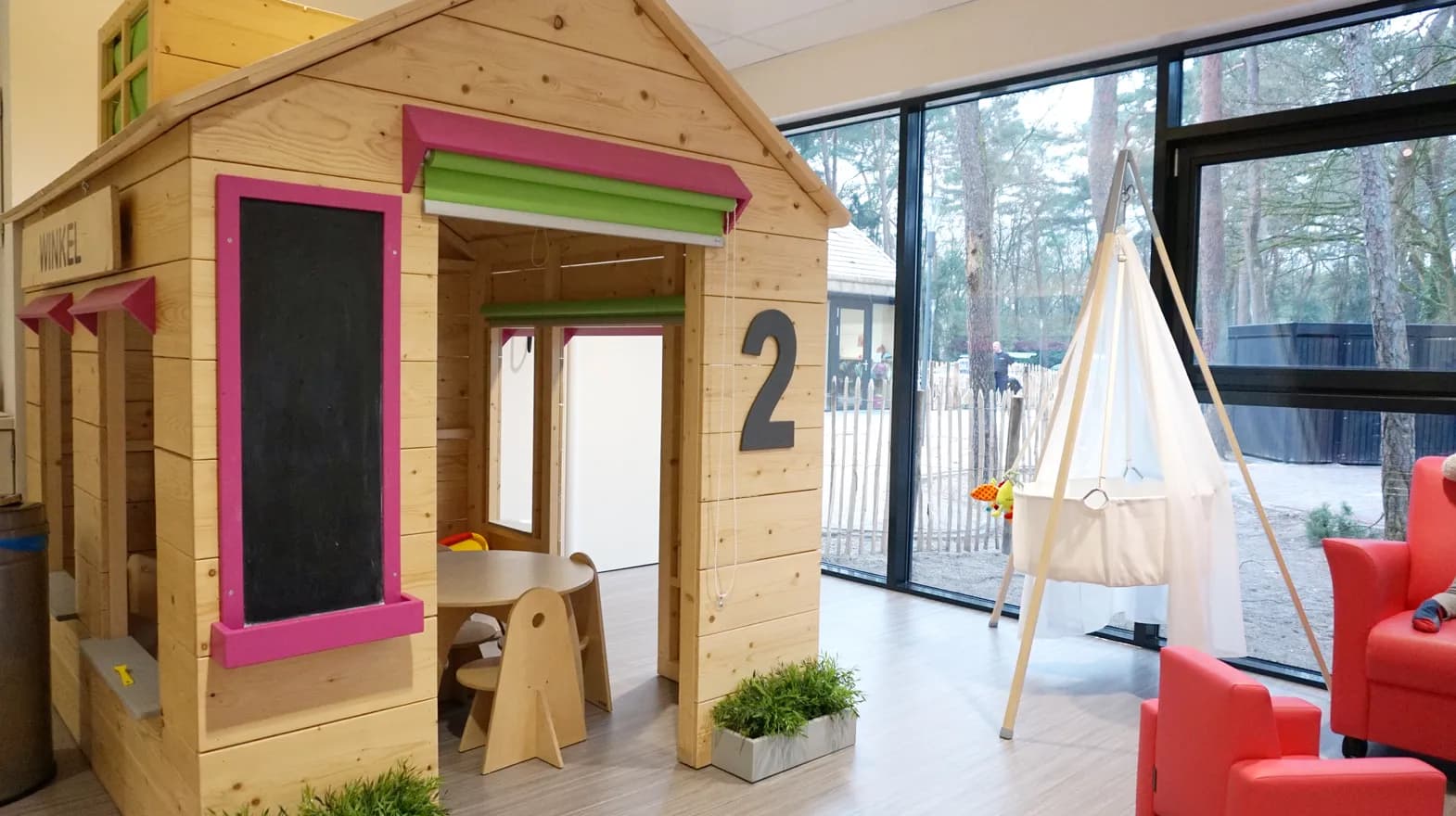 Speelhuis in woonkamer bij Kinderdagverblijf Zeist Kerckebosch van kinderopvang Kind&co ludens