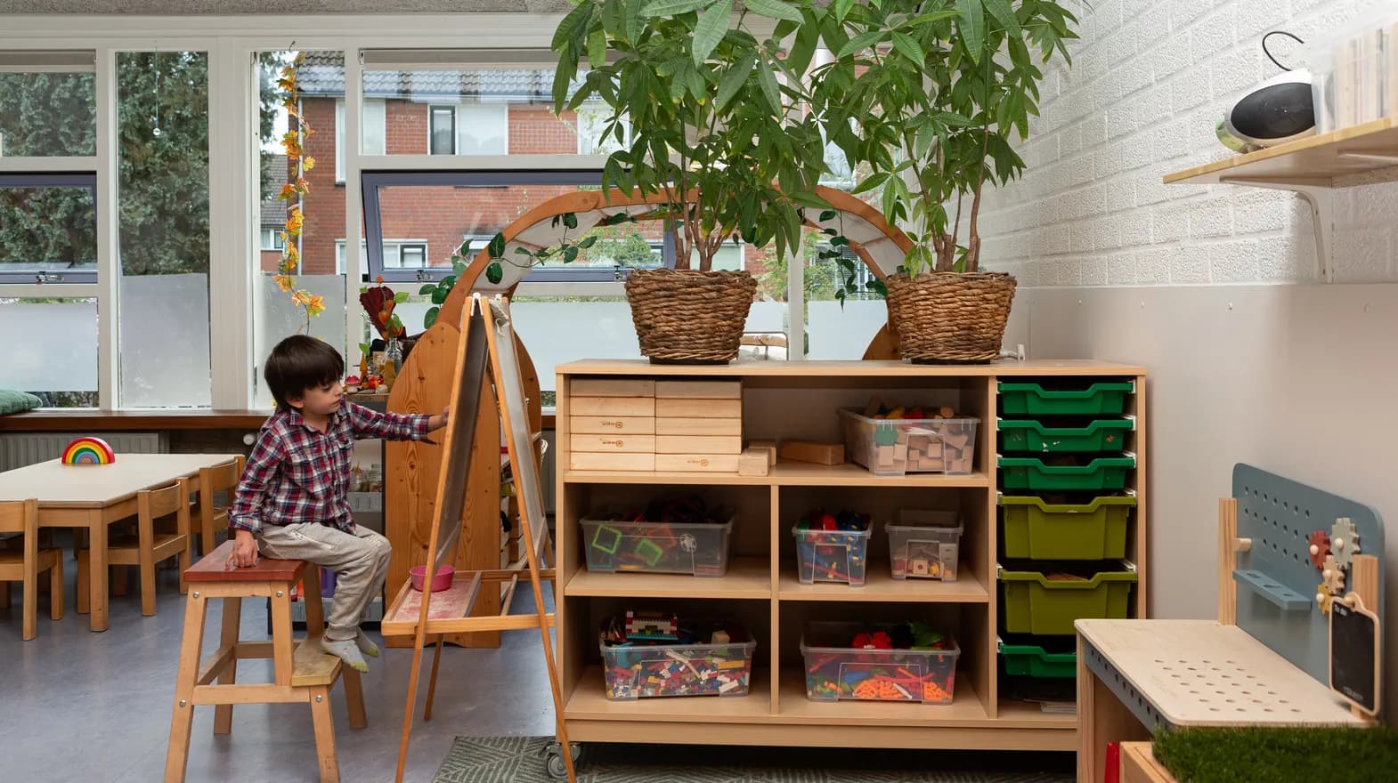 De groepsruimte van buitenschoolse opvang Ay bij kinderopvang Kind&co ludens