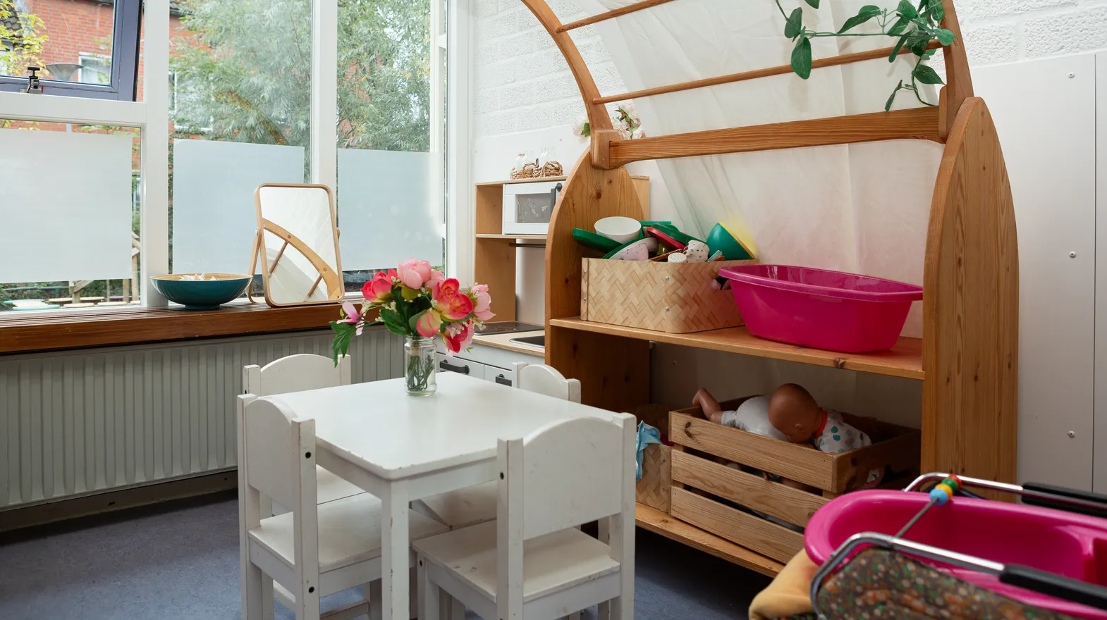 De groepsruimte van buitenschoolse opvang Ay bij kinderopvang Kind&co ludens