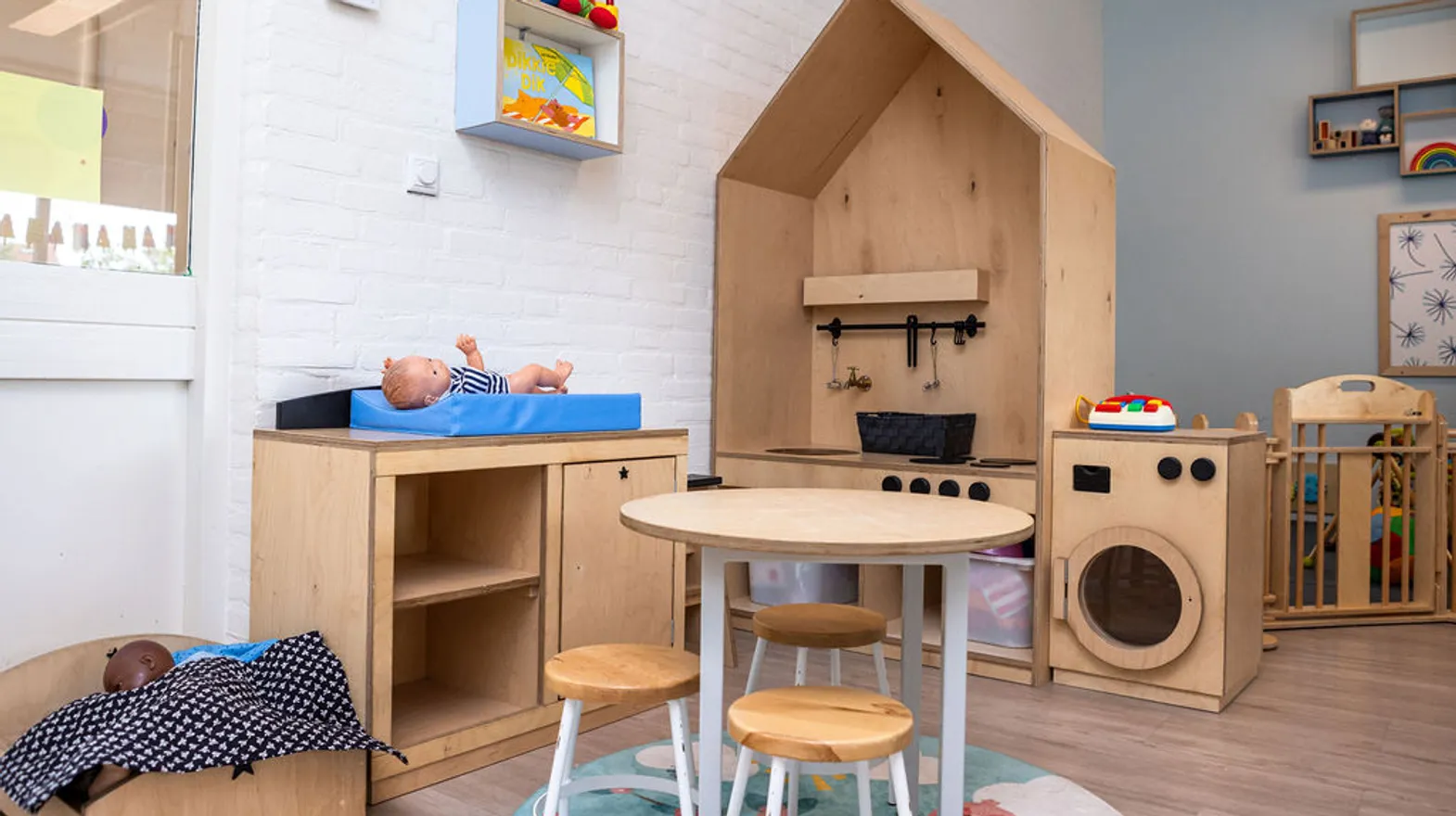 Speelhoek met zitje bij KDV Woerden Tinkelbel van kinderopvang Kind&co ludens