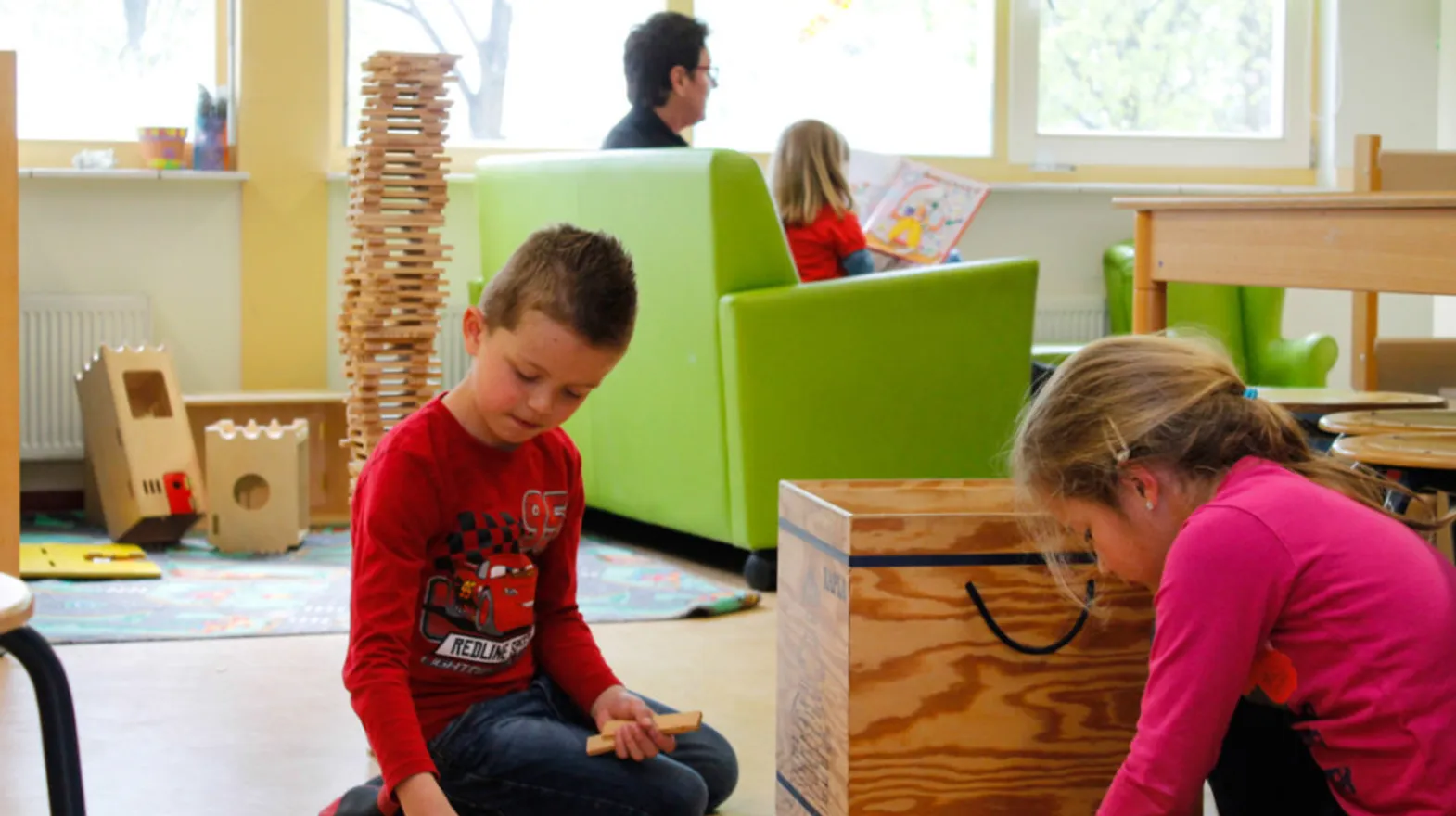 Kinderen spelen in de groepsruimte van buitenschoolse opvang Bever van kinderopvang Kind&co Ludens